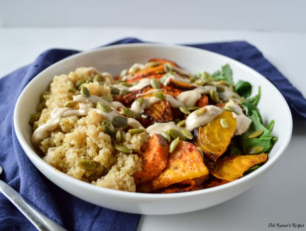 Roasted Root Vegetable and Quinoa Buddha Bowl with Lemon Tahini Dressing and Pumpkin Seeds